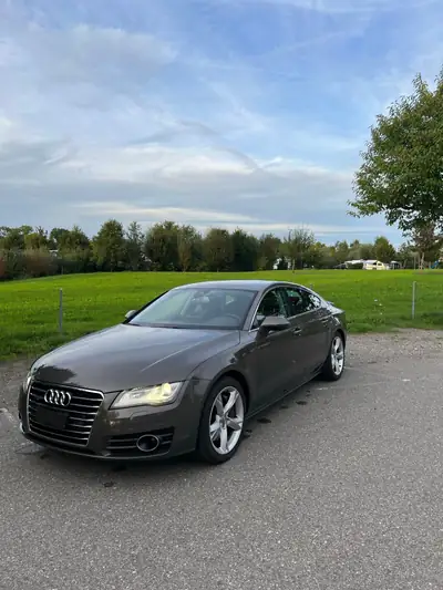 Audi A7 Sportback 3.0 TFSI quattro — Coupé quatre portes premium, 300 ch dynamiques — side view