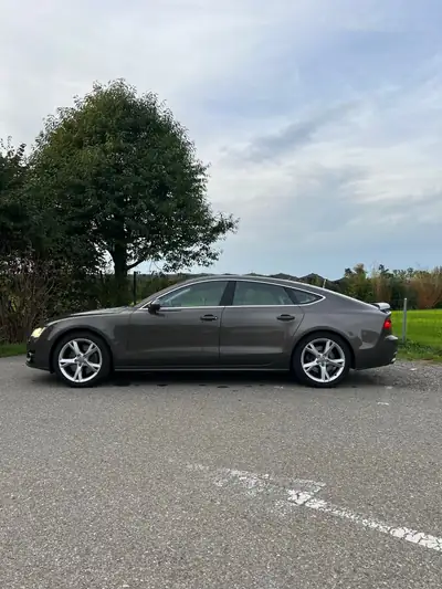 Audi A7 Sportback 3.0 TFSI quattro — Coupé quatre portes premium, 300 ch dynamiques — rear view