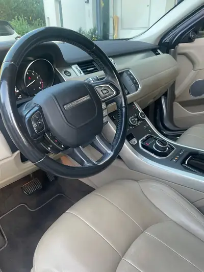 Range Rover Evoque 2.0 Si4 SE — Luxe compact, transmission intégrale et design premium — Miniature 14