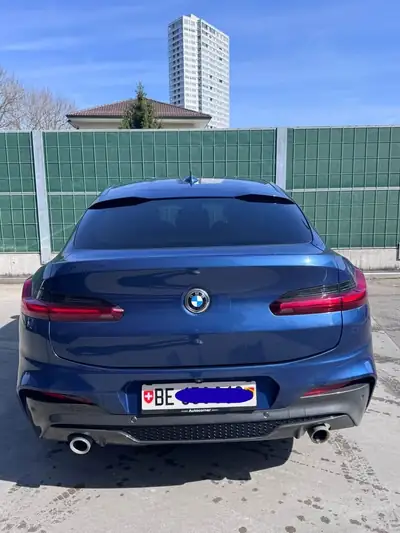 BMW X4 xDrive 30i M Sport — SUV coupé premium, équipements haut de gamme, très bon état — side view