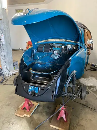 VW Käfer 1965 — Légende automobile avec entrée au registre des véhicules anciens — détail
