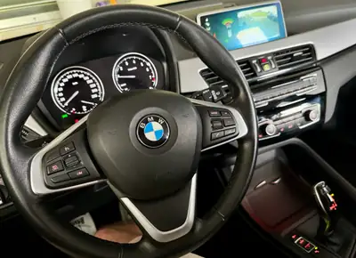 BMW X1 xDrive 20i Steptronic — SUV polyvalent, moteur essence fiable, 103'000 km — dashboard