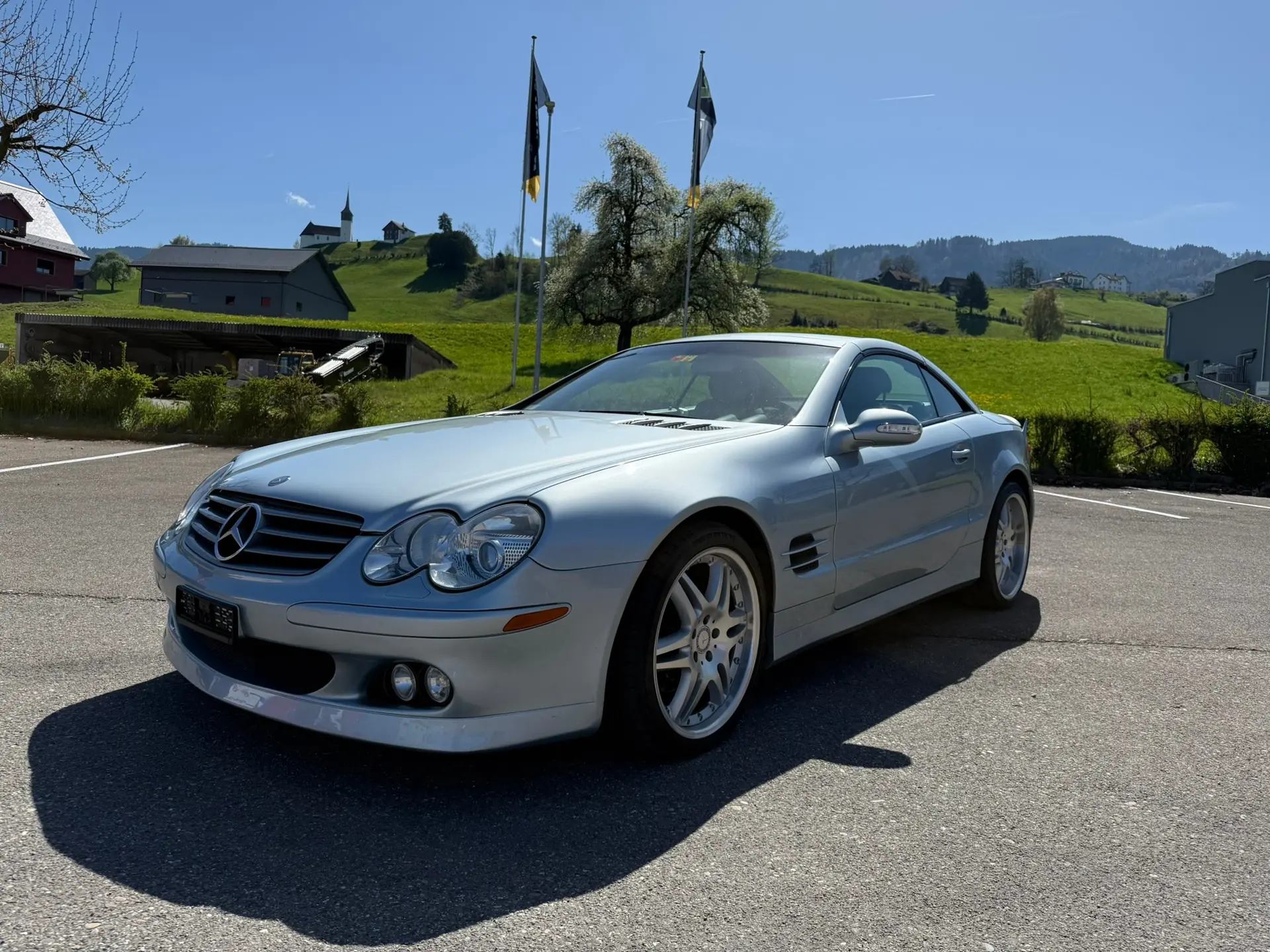 Mercedes-Benz SL 500 BRABUS — Cabriolet de prestige, motorisation 306 ch, kilométrage quasi neuf — vue extérieure