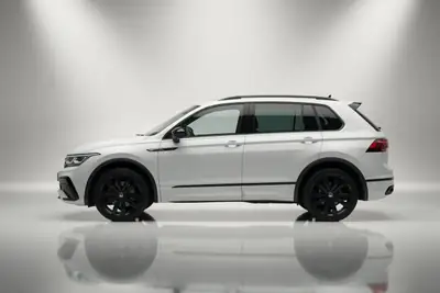 VW Tiguan 2.0 TDI R-Line 4Motion — SUV robuste, 4x4 intelligent et consommation maîtrisée — côté
