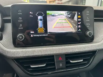 Skoda Kamiq 1.5 TSI Edition Plus DSG — Petit SUV dynamique, 15'000 km seulement — Thumbnail 11