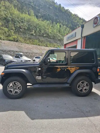 Jeep Wrangler 2.0 Turbo Sport — 3-portes, 272 ch, transmission automatique, véhicule suisse — Seitenansicht
