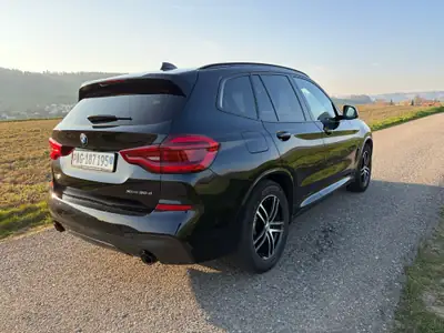 BMW X3 xDrive 30d — SUV premium diesel, 265 ch, faible consommation — rear view