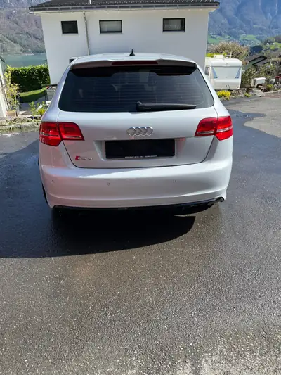 Audi RS3 Sportback 2.5 TFSI quattro — Performance 340 ch, intérieur premium noir — côté