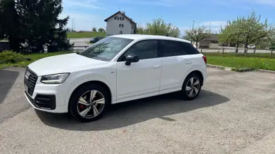 Audi Q2 40 TFSI Sport quattro S-tronic — Sportivité all-wheel drive, kilométrage maîtrisé — fianco