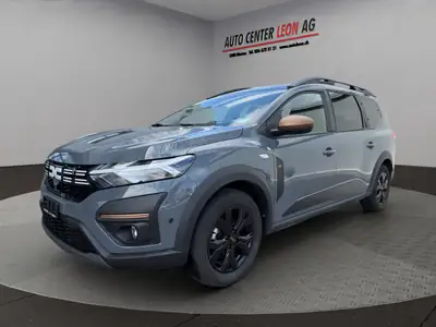 Dacia Jogger HEV 140 Extreme+ — Monospace hybride 7 places, consommation ultramodérée — side view