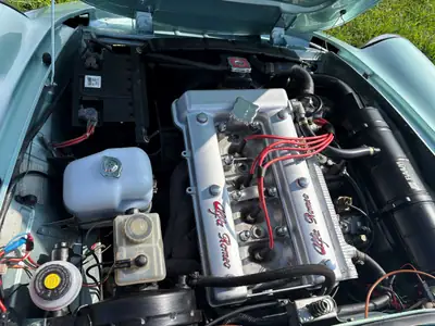 Alfa Romeo Spider 2.0 Veloce — Cabriolet italien légendaire, moteur essence 128 ch — fianco