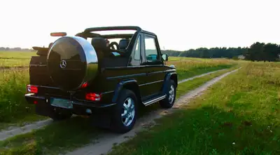 Mercedes-Benz G 350 Cabrio — Un classique luxe tout-terrain, état collection impeccable — Miniatur 18
