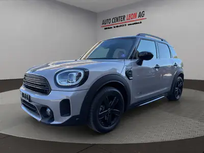 MINI Countryman Cooper ALL4 Steptronic — SUV compact dynamique, traction intégrale et faible kilométrage — side view