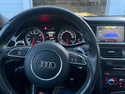 Audi RS4 Avant 4.2 FSI V8 — Break sportif 450ch, ouvert à 280 km/h — fianco