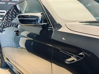 BMW M5 xDrive Competition — 626 ch, performances extrêmes et luxe intégral — Miniature 10