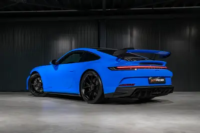 Porsche 911 GT3 Schaltgetriebe — Légendaire sportive à boîte manuelle, 65 km au compteur — side view