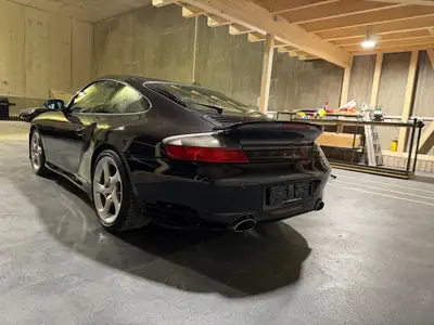 Porsche 911 Turbo 2003 — Coupé sportif légendaire, 420 ch et boîte manuelle — arrière