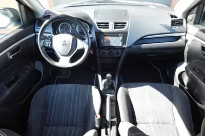 Suzuki Swift 1.2i 16V — Citadine fiable, premier propriétaire, état impeccable — Miniature 11