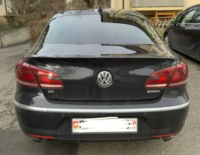 VW Passat CC 2.0 TDI BlueMotion — Élégance coupé, motorisation économe et fiable — vista posteriore