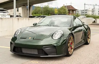 Porsche 911 Carrera GT3 PDK Touring — Superbe verte métallisée, 560 km seulement — exterior view