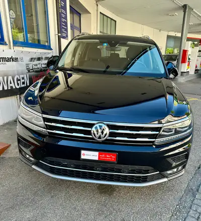 VW Tiguan Allspace 2.0 TSI Highline 4Motion — 7 places, toit panoramique, SUV familial éprouvé — côté