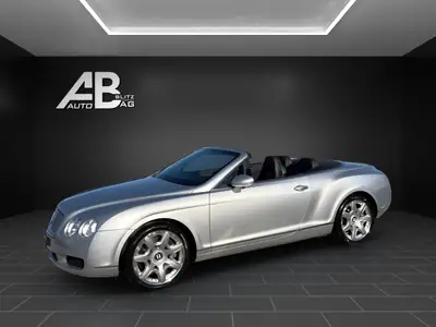 Bentley Continental GTC 6.0 — Cabriolet de prestige, 560 ch, toutes roues motrices — fianco