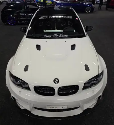 BMW 1er M Coupé 2012 — 340 ch, boîte manuelle, design iconique — vista posteriore