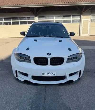 BMW 1er M Coupé 2012 — 340 ch, boîte manuelle, design iconique — fianco