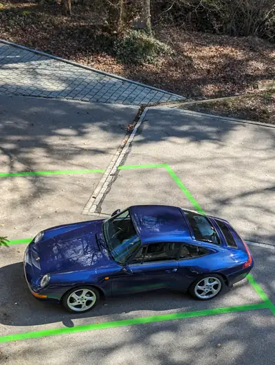 Porsche 911 993 Coupé 1995 — Icône des années 90, moteur atmosphérique 3.6L — détail