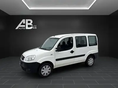 Fiat Doblò 1.3 JTD Active — Monospace diesel fiable, 168 000 km, sans sinistre — side view
