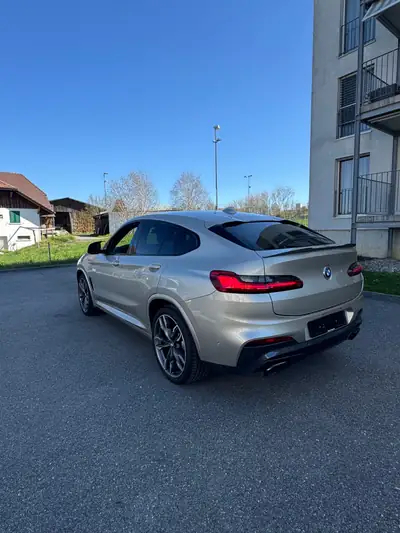 BMW X4 M40i Steptronic — SUV coupé sportif, 360 ch et seulement 64'200 km — vista posteriore