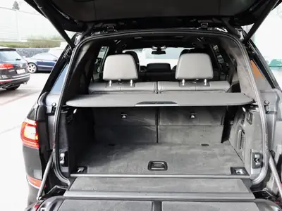 BMW X7 M50i — SUV premium 7 places, 530 ch et équipements haut de gamme — side view