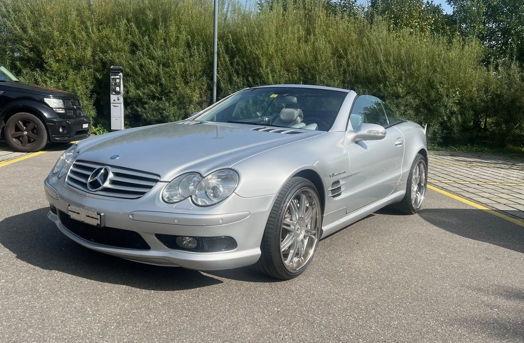 Mercedes-Benz SL 55 AMG — Cabriolet légendaire, 476 ch et seulement 115 900 km — vista esterna