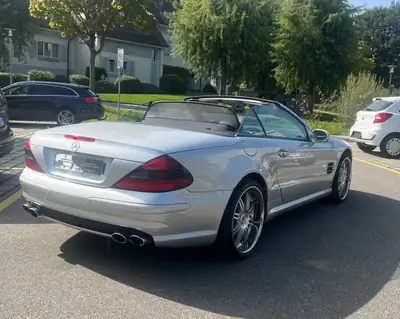 Mercedes-Benz SL 55 AMG — Cabriolet légendaire, 476 ch et seulement 115 900 km — fianco