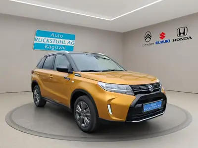 Suzuki Vitara 1.4 T Sakura Hybrid 4x4 — SUV compact hybride, traction intégrale performante — side view