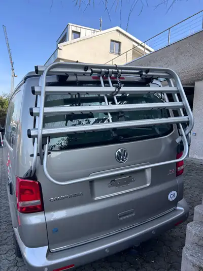 VW T5 California — Le camping-car mythique, diesel performant, kilométrage imbattable — Heckansicht