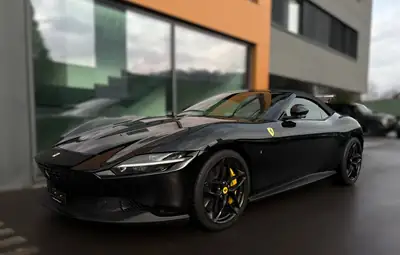 Ferrari Roma Spider 3.9 Turbo — Cabriolet sport légendaire, quasi-neuf avec 390 km — side view