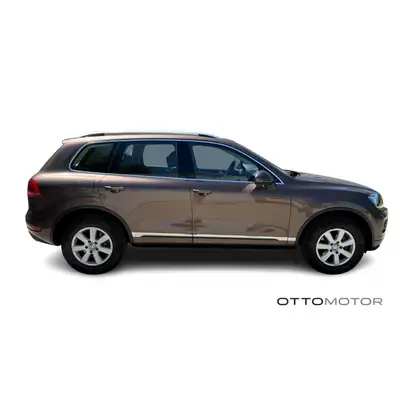 VW Touareg 3.0 V6 TDI — SUV premium diesel, 124'000 km, traction intégrale — side view