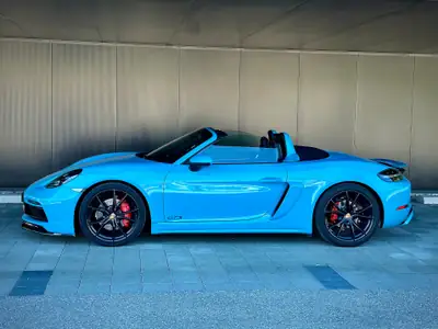 Porsche 718 Boxster GTS 2.5 PDK — Cabriolet sportif Miami Blue, 65'000 km — arrière