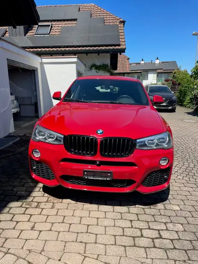 BMW X4 xDrive35i — SUV Coupé sportif, 306 ch et design rouge éclatant — vista esterna