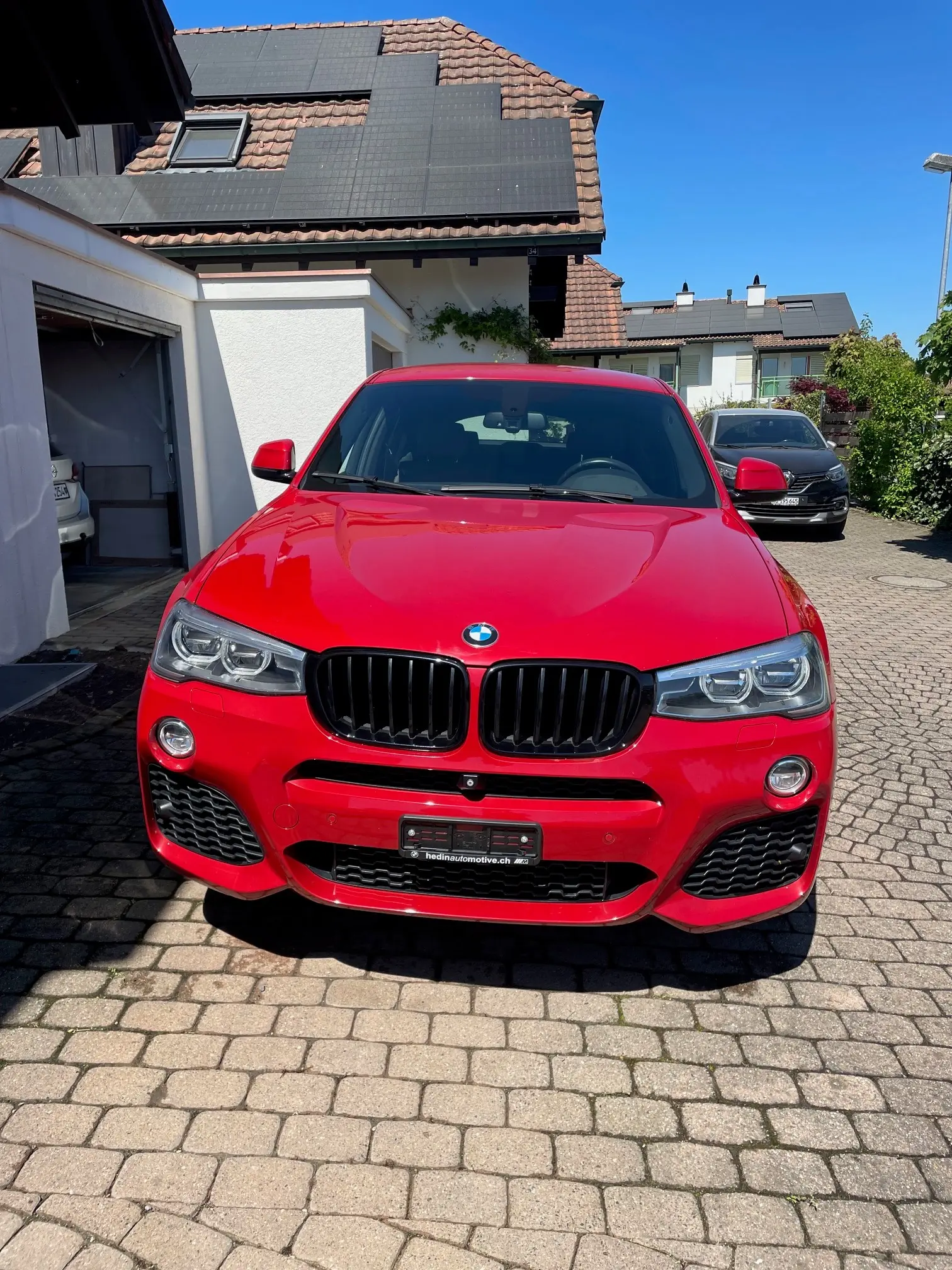 BMW X4 xDrive35i — SUV Coupé sportif, 306 ch et design rouge éclatant — vista esterna