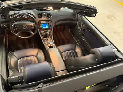Mercedes-Benz SL 55 AMG — Cabriolet légendaire V8 500 ch, histoire sportive garantie — side view
