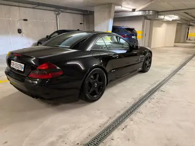 Mercedes-Benz SL 55 AMG — Cabriolet légendaire V8 500 ch, histoire sportive garantie — interior