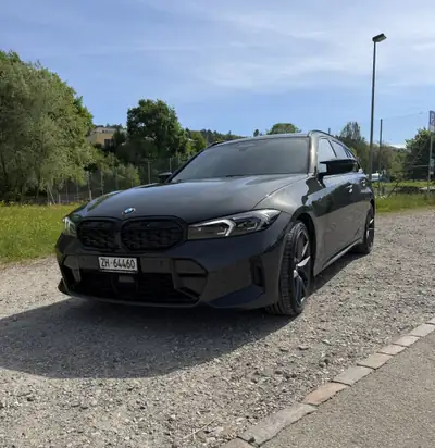 BMW M340i xDrive 48V Touring — Performance hybride et polyvalence familiale — rear view