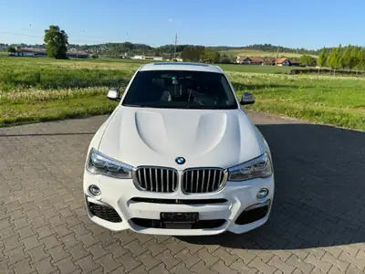 BMW X4 M 40i — SUV coupé sportif, 360 ch et équipement premium complet — côté