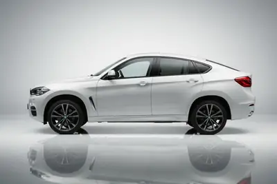 BMW X6 xDrive 40d — SUV coupé diesel puissant, 152 900 km, moteur V6 performant — side view