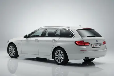 BMW 520d Touring xDrive — Break diesel efficace, entretien économique — côté