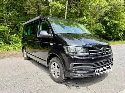 VW T6 2.0 TDI 150 Ocean Liberty — Camping-car fiable, moteur révisé, prêt à l'aventure — côté