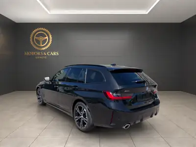BMW 330e xDrive Touring M Sport — Hybride rechargeable, 12'000 km seulement — Heckansicht