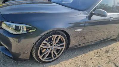 BMW M550d xDrive — Break sportif diesel, 381 ch et équipements Premium — Heckansicht